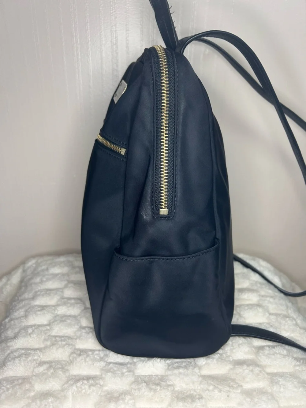Kate Spade Blake Ave black nylon mini backpack with gold hardware